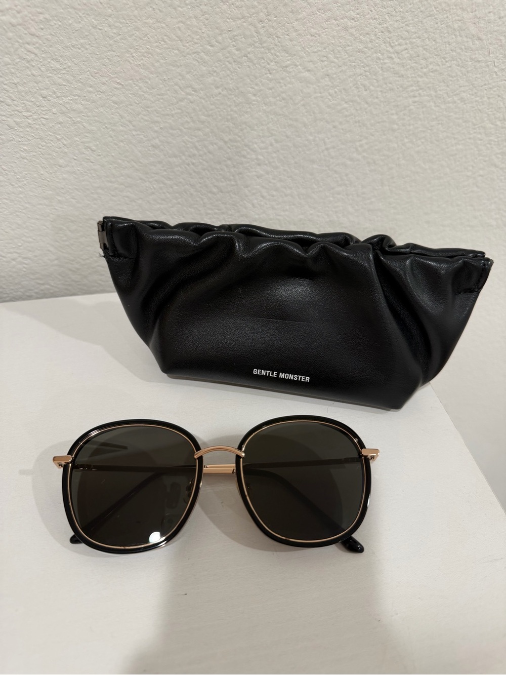 GENTLE MONSTER Black and Gold Round Sunglasses